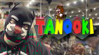 A man in a pup mask and name header: Tanooki