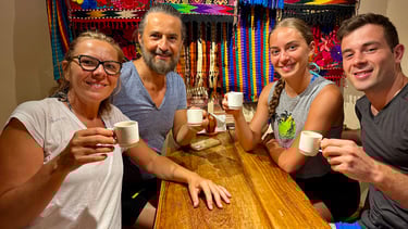 Four people enjoying a chocolate tasting at Reina's