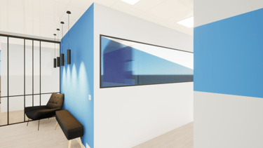 Transformation de bureaux avec des cloisons, une baie vitrée, des assises et mur de couleur bleue