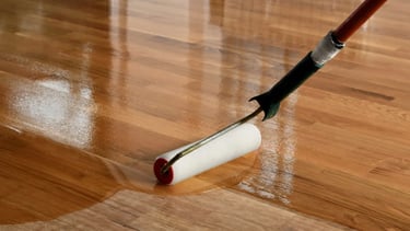 Clear coat of finish, natural color hardwood floors. Wood floor refinishers near me.