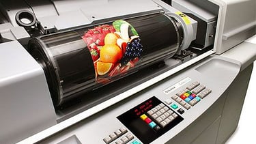 Digital drum scanning machine printing colorful image on paper