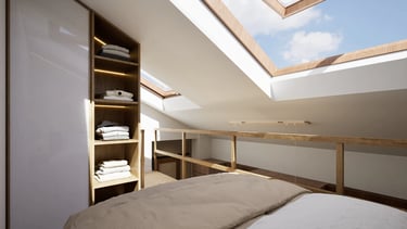 Altillo dormitorio con cama, armario abierto iluminado y lucernarios.