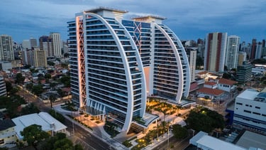 a large building with a large building in the background