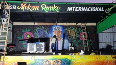 Mokan Ranko Internacional outdoor concert stage featuring colorful Shipibo Konibo mural art