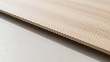Tight macro detail shot of a flawless wood-to-steel material transition, crisp architectural photography, bright daylight, clean neutral tones