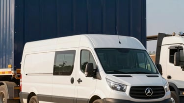 Photography of a modern white transport van and a heavy-duty truck parked in front of a large South American &amp;#x2F; Brazilian infrastructure project. The lighting is crisp morning sun, highlighting the metallic surfaces. The color palette features dark blue and sand beige tones, conveying professionalism and robustness.