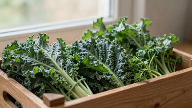 Close-up of a rustic wooden crate filled with vibrant green kale and herbs, soft natural daylight