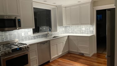 Seattle kitchen remodel, custom cabinets and quartz & marble tile backsplash. Home Renovation SRVCs