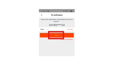 Mobile app ID verification screen showing phone number masking and orange Next button