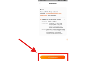 A mobile risk center notification with a red arrow pointing to the lift restrictions button