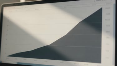 Wide panoramic 21:9 frame, extreme close-up of a stark off-white and deep charcoal digital interface showing exponential growth curves, sharp direct sunlight casting high-contrast shadows, clean architectural geometry.