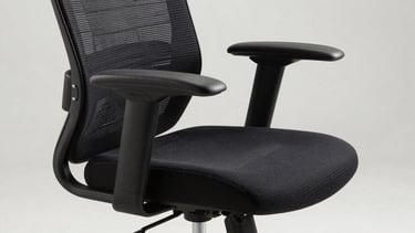 Clean photography of a modern ergonomic office chair in a bright studio, representing the comfort and stability of our professional services.