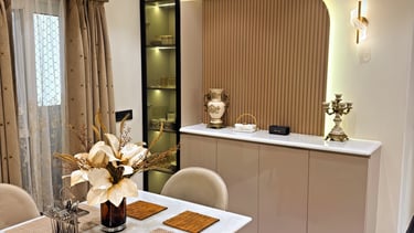 Modern luxury dining room interior with elegant marble table and decorative wood wall paneling.
