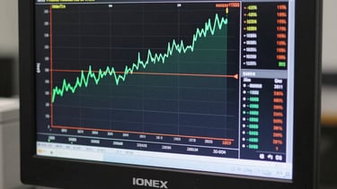 A high-resolution display showing a live conductivity graph on the IONEX controller. The aesthetic is clean, professional, and data-driven.
