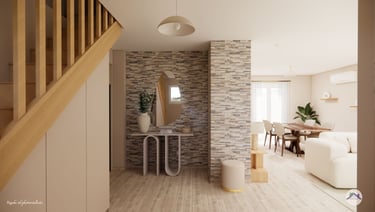 Entrée avec mur de parement, console en travertin et ses éléments déco, rangement sur mesure