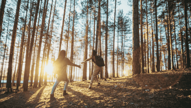 two people enjoying forest walk