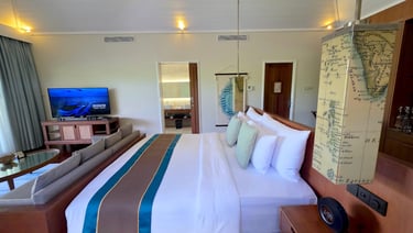 Hurawalhi Maldives beach pool villa bedroom