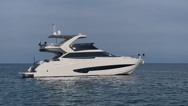 a yatch in the water with a sky background