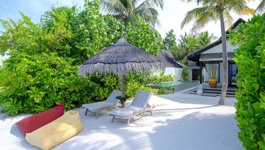 Ozen Life Maadhoo Maldives beach earth villa with pool