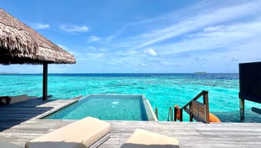 Ayada Maldives sunset ocean suite with pool outdoor