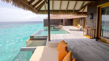 Ayada Maldives sunset ocean suite with pool outdoor