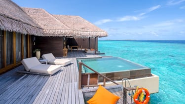 Ayada Maldives sunset ocean suite with pool outdoor
