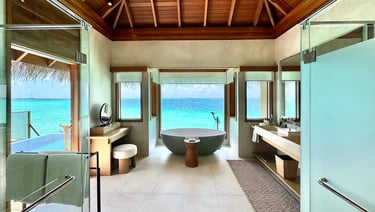 Huvafen Fushi Maldives lagoon bungalow with pool bathroom
