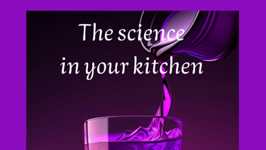 a glass of water with a purple background
