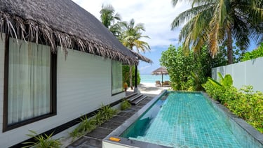 Ozen Life Maadhoo Maldives beach earth villa with pool