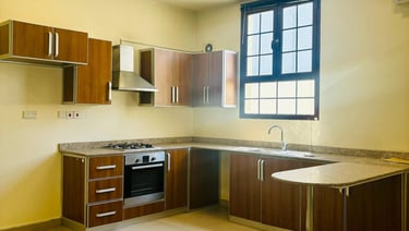 furnished kitchen in residential property owned by the other dimension real estate agency in Bahrain