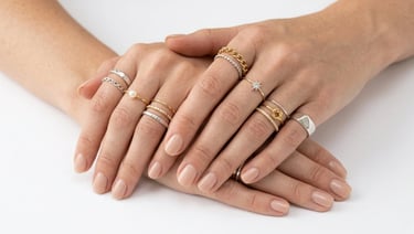 Stylish knuckle rings and midi rings on elegant fingers with minimalist jewelry fashion