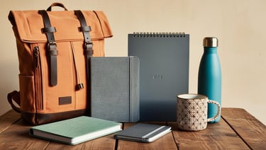 cuadernos anillados, cosidos, mochilas, papeleria, para empresas con logo personalizado