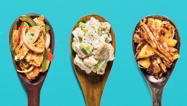 Three distinct spoons, each featuring a different Thrive freeze dried meat dishes prepared.