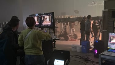 A group of people in a film studio shooting a movie