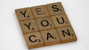 Scrabble tiles saying, "yes you can"