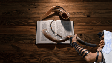 a man blowing a horn horn horn horn