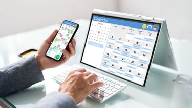 Image of a person scheduling an appointment on desktop and mobile