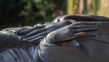 Close-up of the Buddha’s hands in a meditative gesture, conveying tranquility and mindful presence.