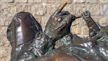 Overhead view of Hilda Gobbi's sculpted hand, little finger pointing out with careful precision.