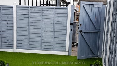 Standard lap panel fence painted grey with white concrete Romford - Hornchurch - Brentwood