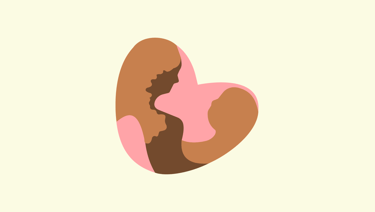 a heart shaped chocolate covered cookie with a pink heart