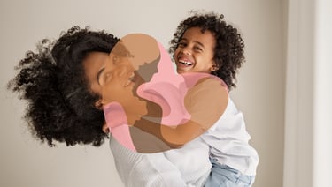 a woman holding a child in her arms