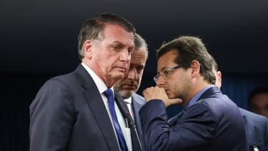 two men in suits and ties standing next to each other