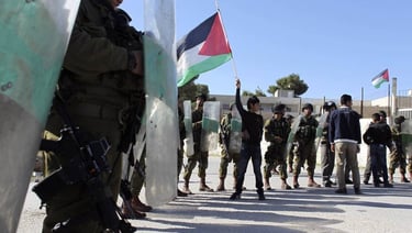 a group of soldiers standing in front of a group of people