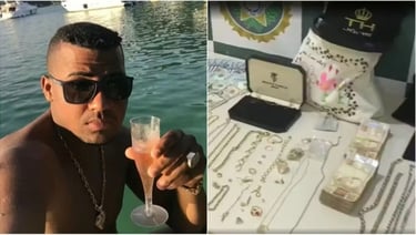 a man in sunglasses and sunglasses is holding a glass of wine