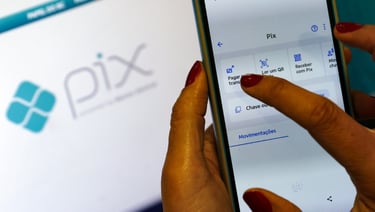 a person holding a phone in their hand