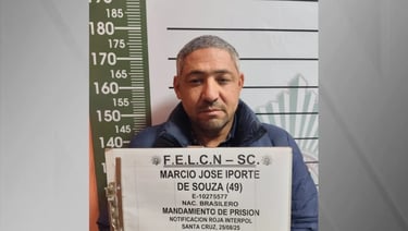 a man in a blue jacket is holding a sign that says,'feel like