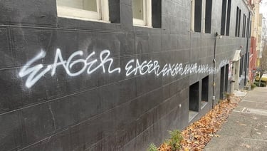 low-quality-malicious-graffiti-on-a-wall