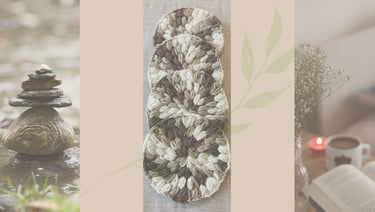 Calm rock stack, crochet coasters, and cozy candle, flowers, book and coffee