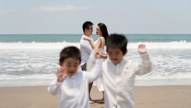 Children running and playing during a natural family photography session at W Bali Seminyak